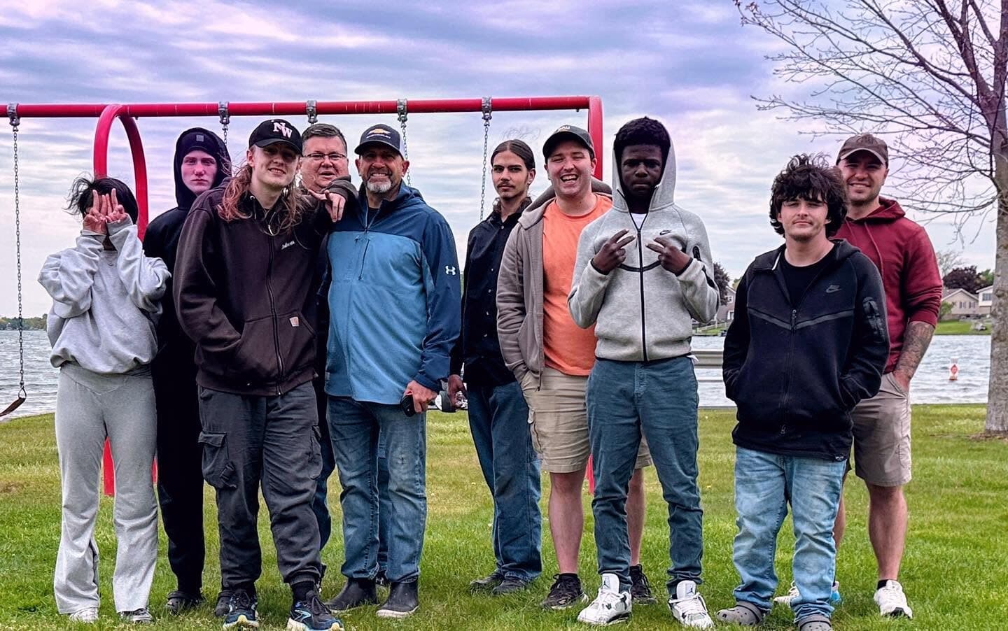 Rise Above students and staff together on a fishing trip